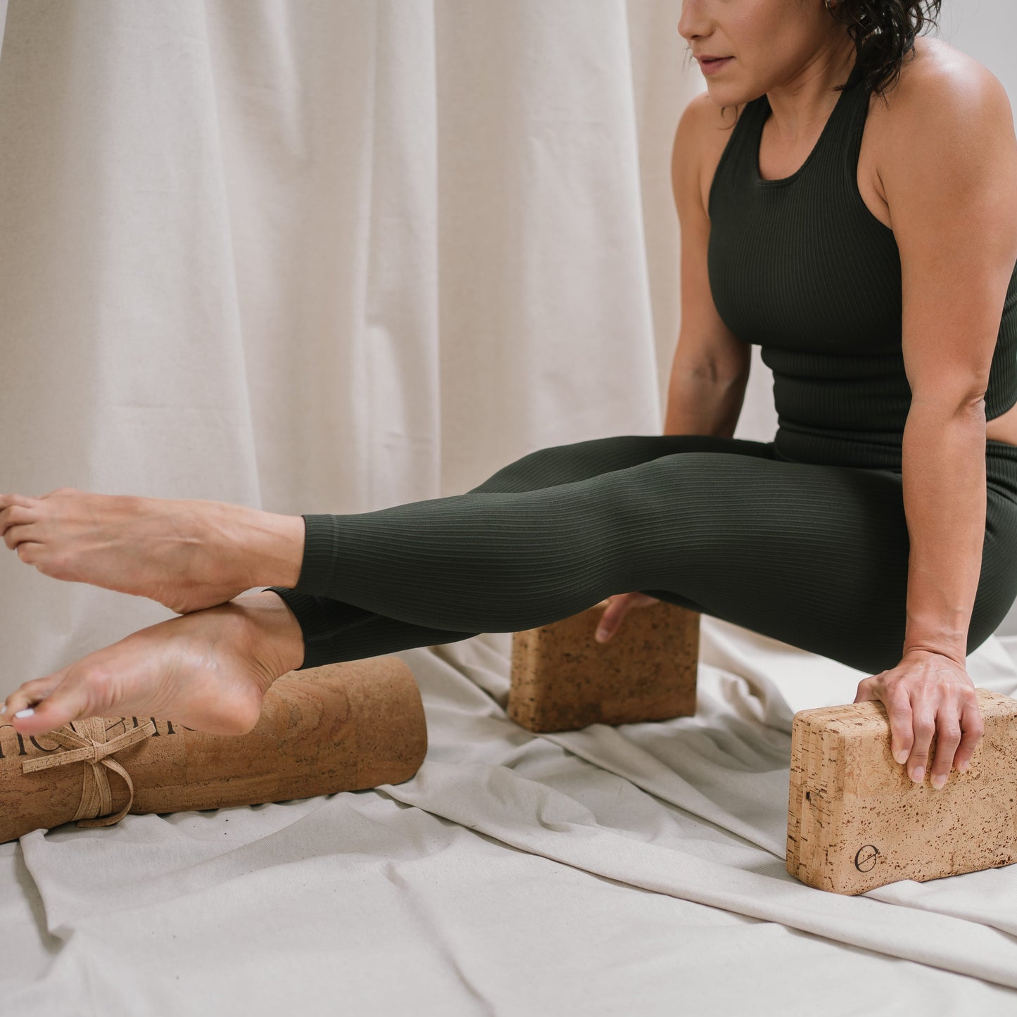 Yogi using Noveme yoga mat and block set