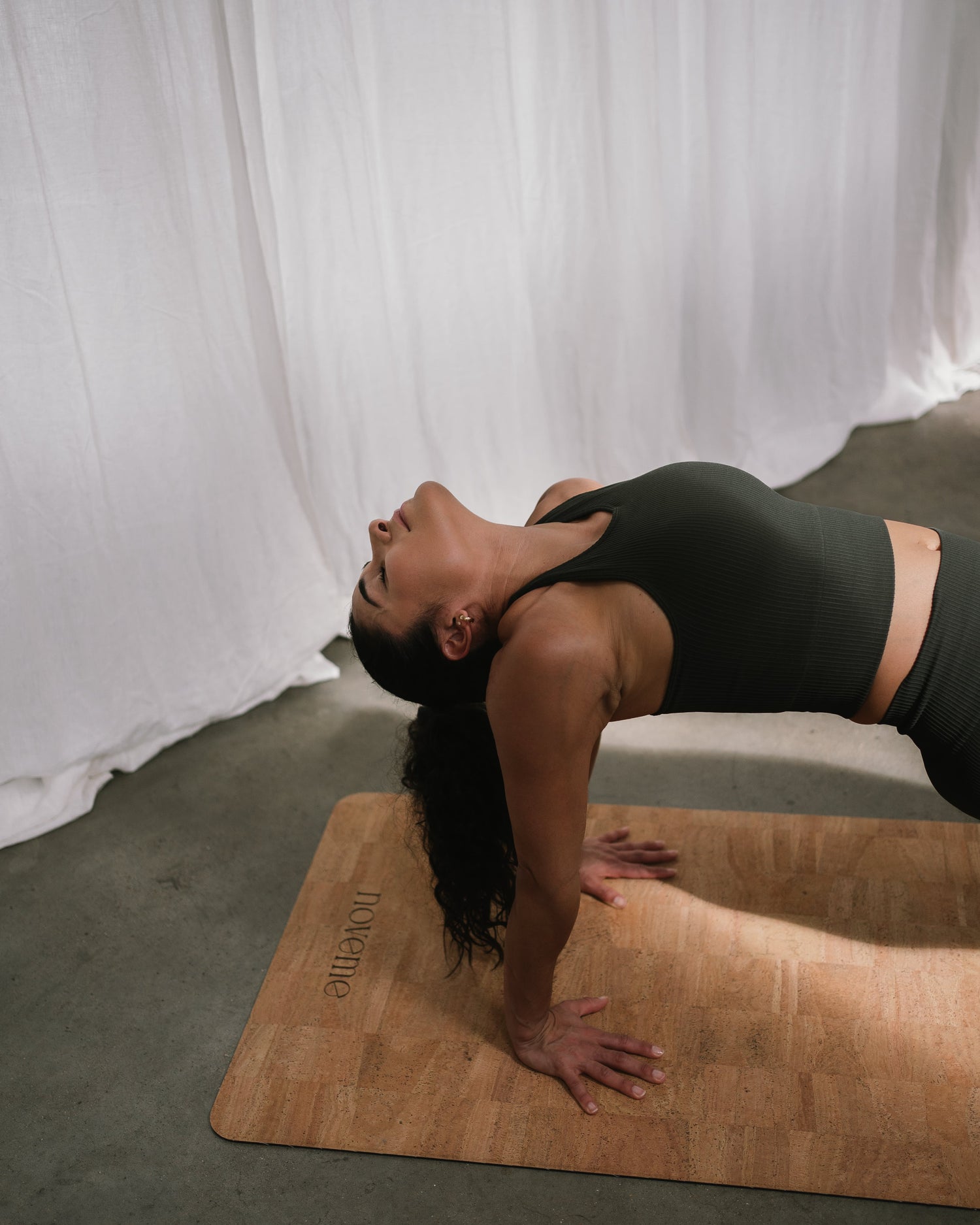 Yogi practicing on a Noveme cork yoga mat