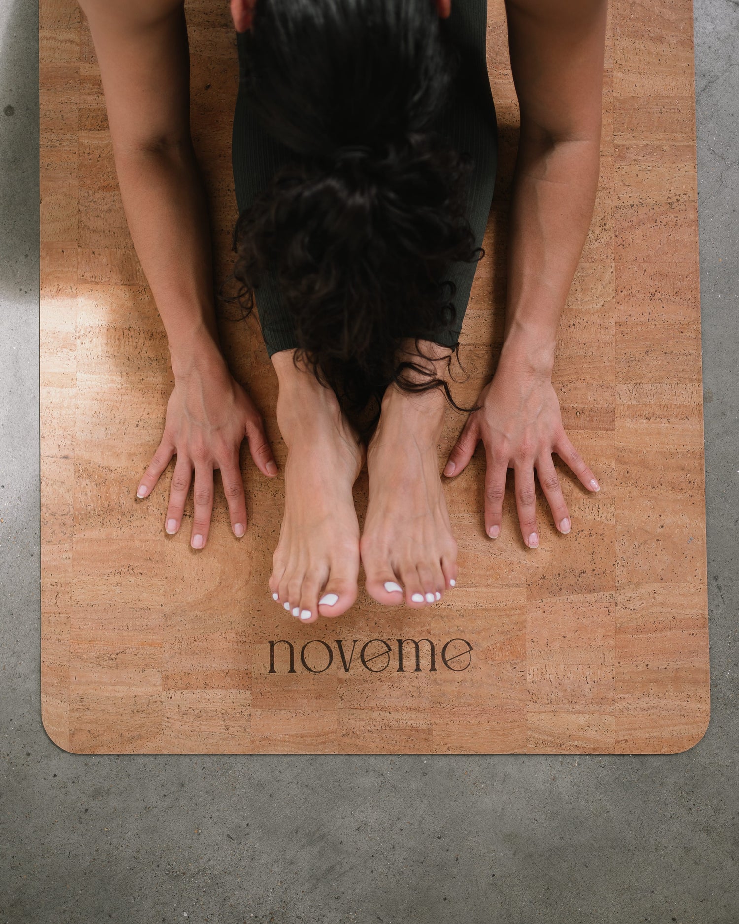 Yogi practicing on a Noveme cork yoga mat